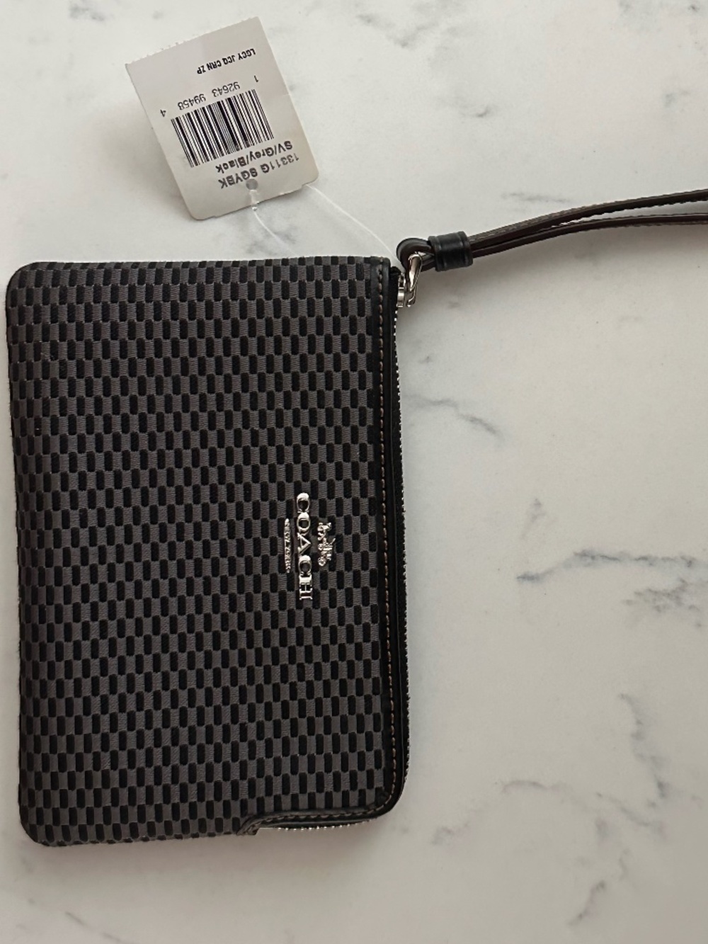 COACH ZIP WRISTLET IN LEGACY JACQUARD